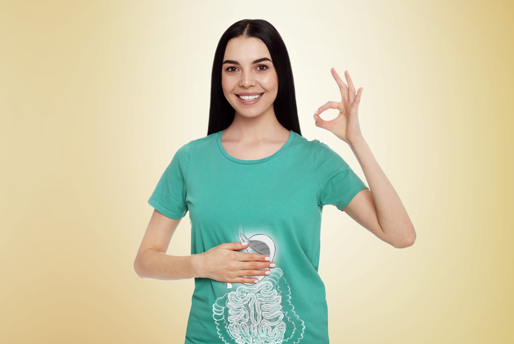Happy Healthy Woman Touching Her Belly on White Background